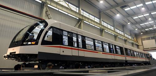 Train <<maglev>> (coussin magnétique) fabriqué en
série en Chine